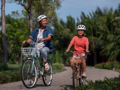full-shot-family-cycling-outdoors_23-2150348457